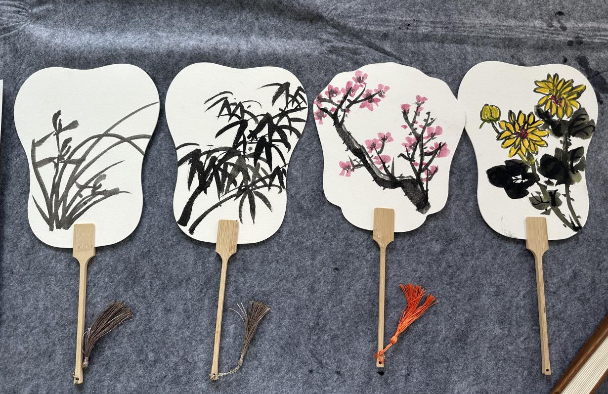 墨韵传薪火 书画润心田 ——汪沟小学开展“五老”进校园活动节